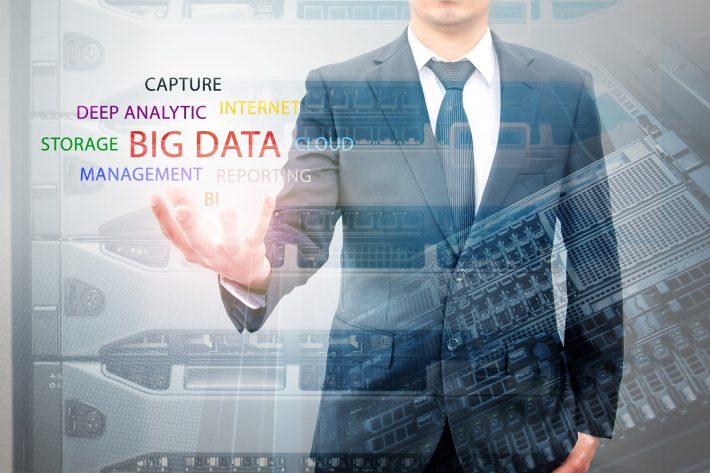 Double Exposure Of Businessman Holding Big Data Information And