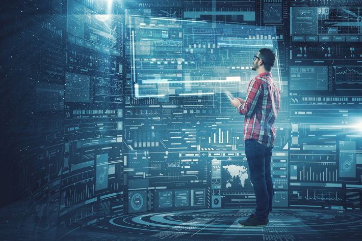 Guy using tablet pc . Mixed media